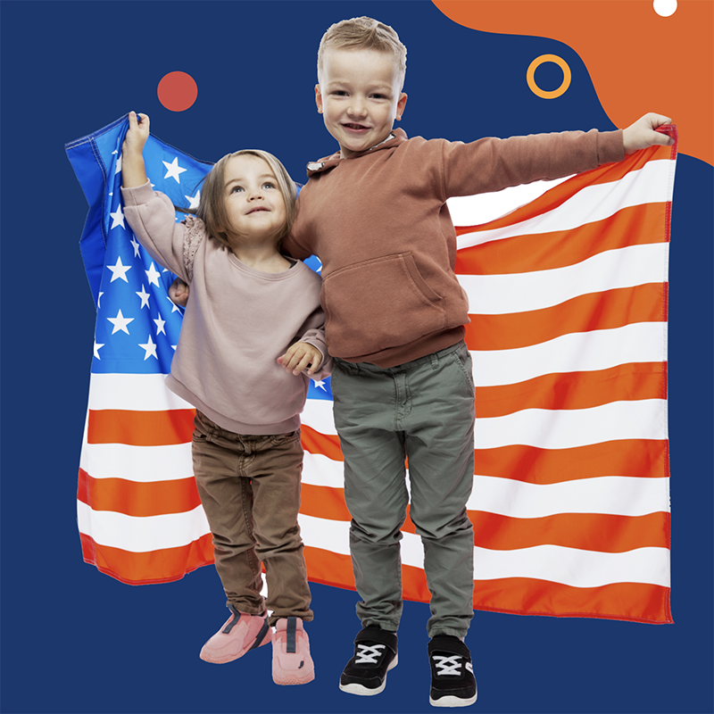 Kids holding an American Flag