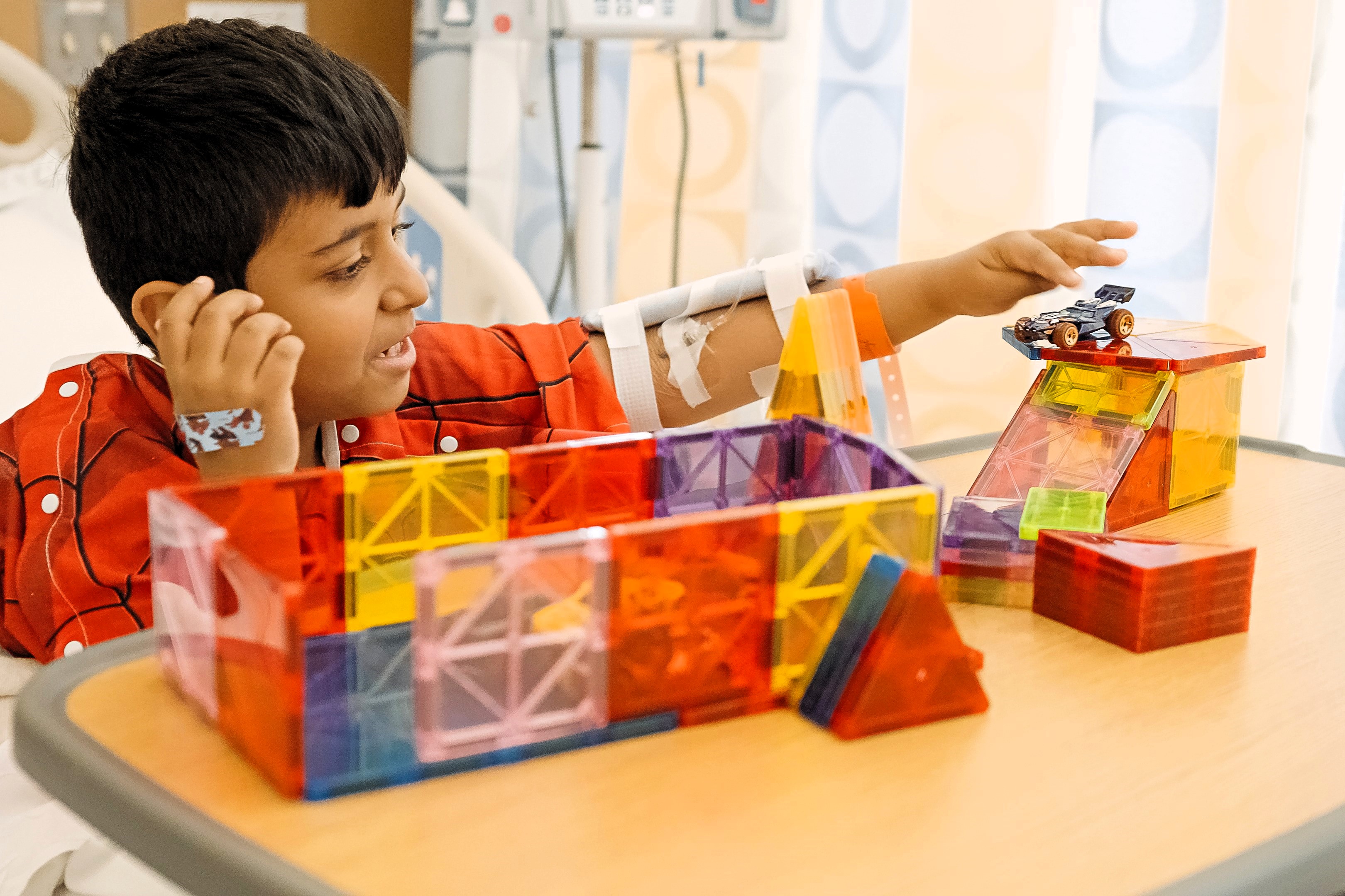pediatric patient playing with toys